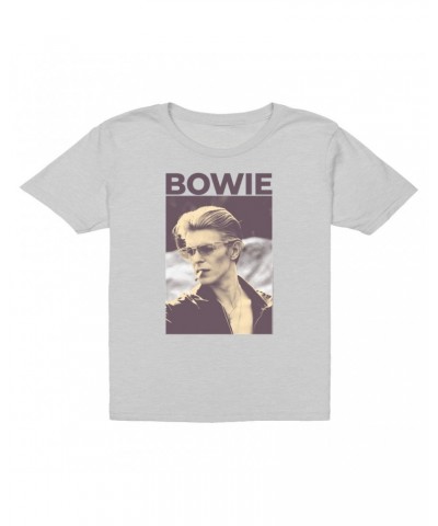 David Bowie Kids T-Shirt | The Man Who Fell To Earth Sepia Photo Kids T-Shirt $11.48 Kids